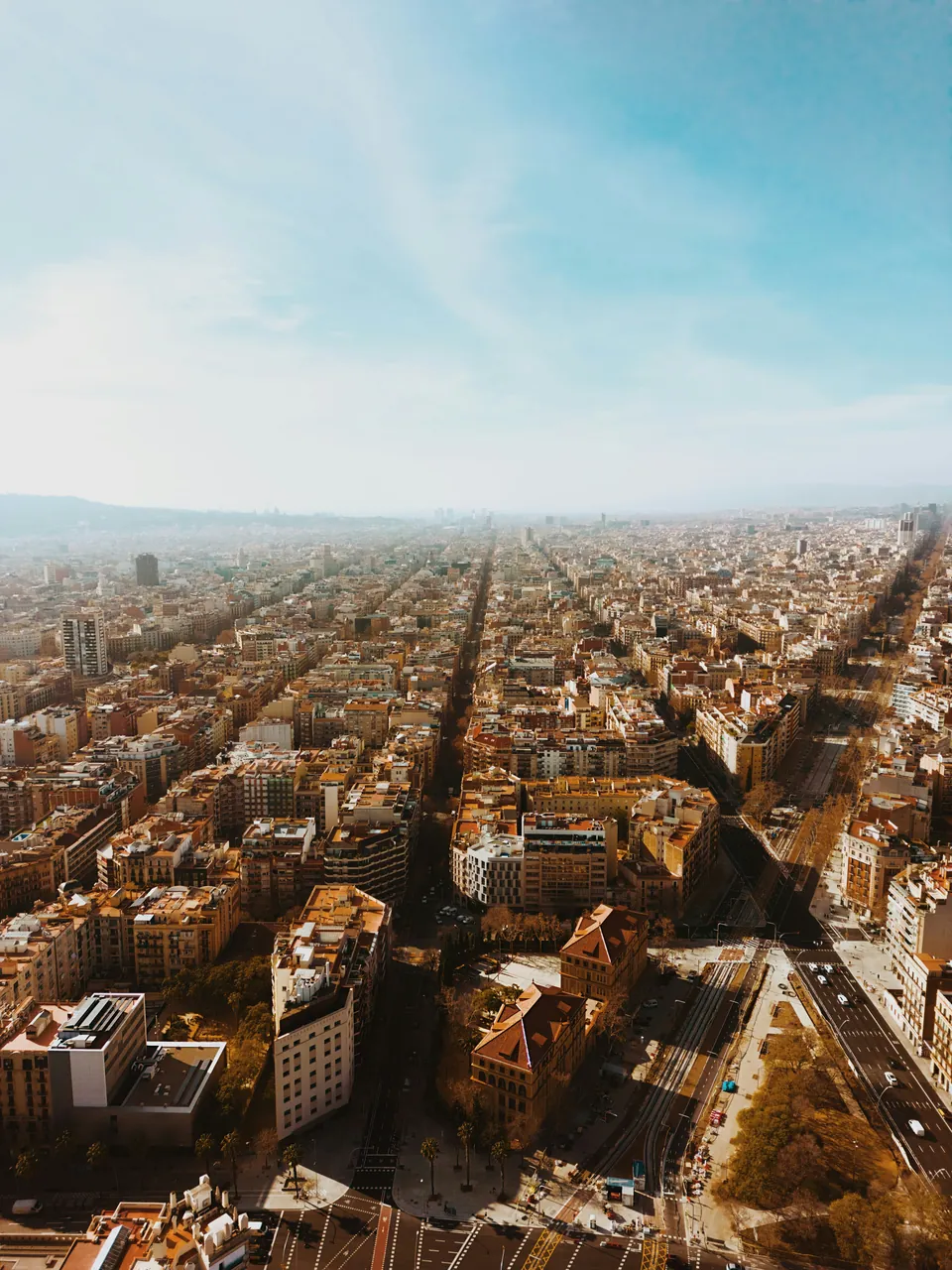 Aerial view of Barcelona's grid of streets in warm light
